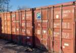 20ft zeecontainer – wind- en waterdicht geleverd met kraanwagen